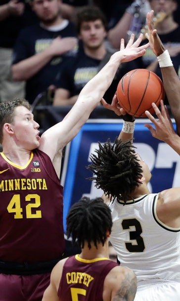 Edwards scores 17 to lead No. 17 Purdue over Minnesota 73-63